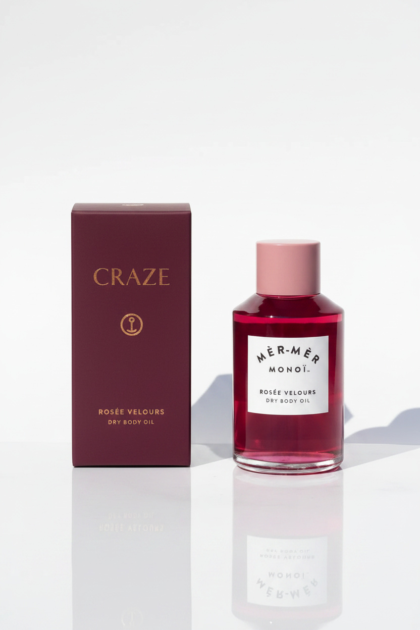 CRAZE Rosée Velours Dry Body Oil bottle with deep burgundy gift box packaging