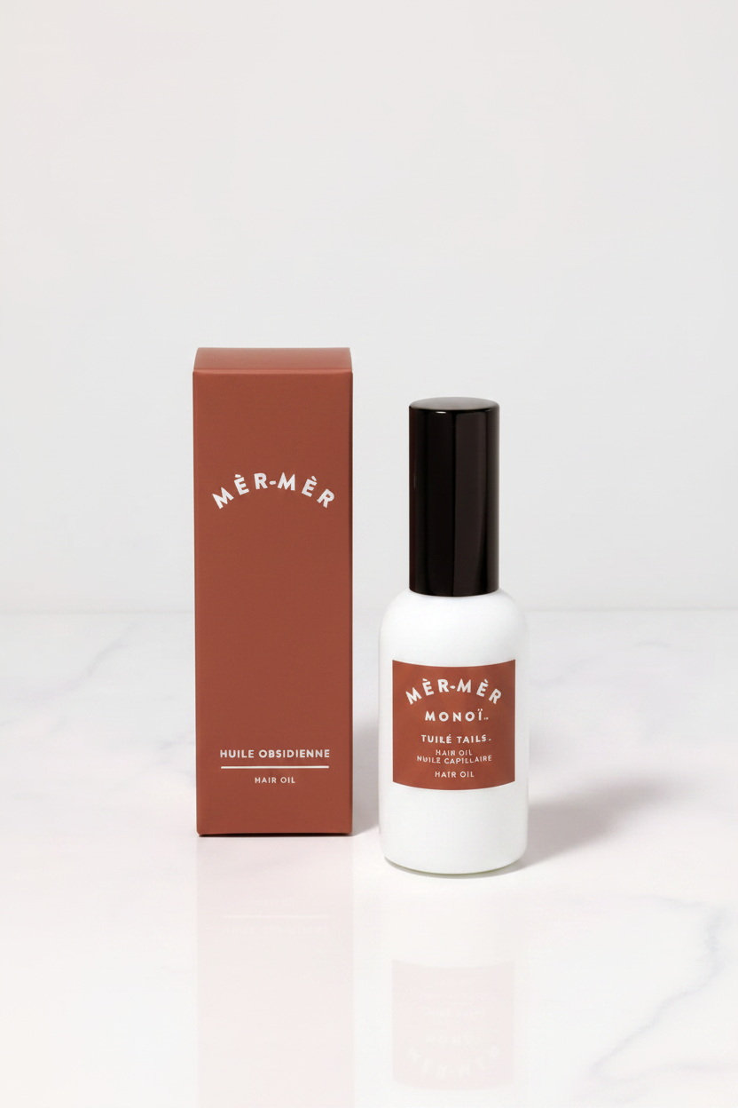 CRAZE Huile Obsidienne Hair Oil bottle with deep terracotta-rust gift box
