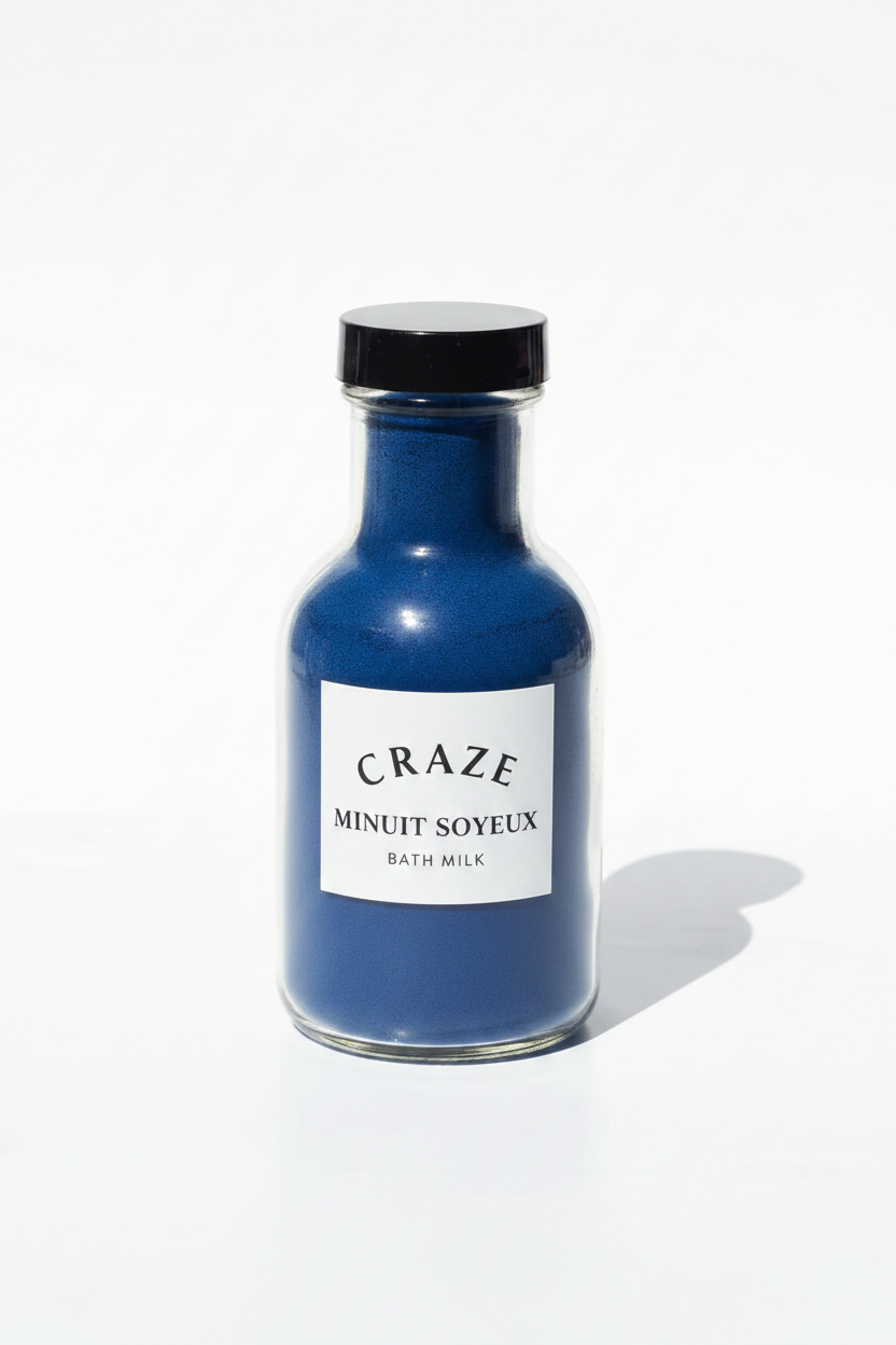 CRAZE Minuit Soyeux Bath Milk midnight-blue powder in small clear glass milk bottle