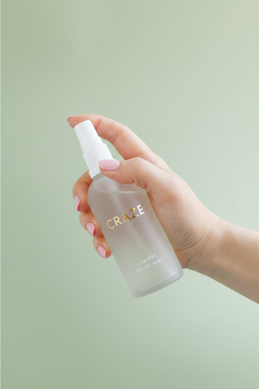 CRAZE Lumière Serum Mist - In-Hand Lifestyle Shot